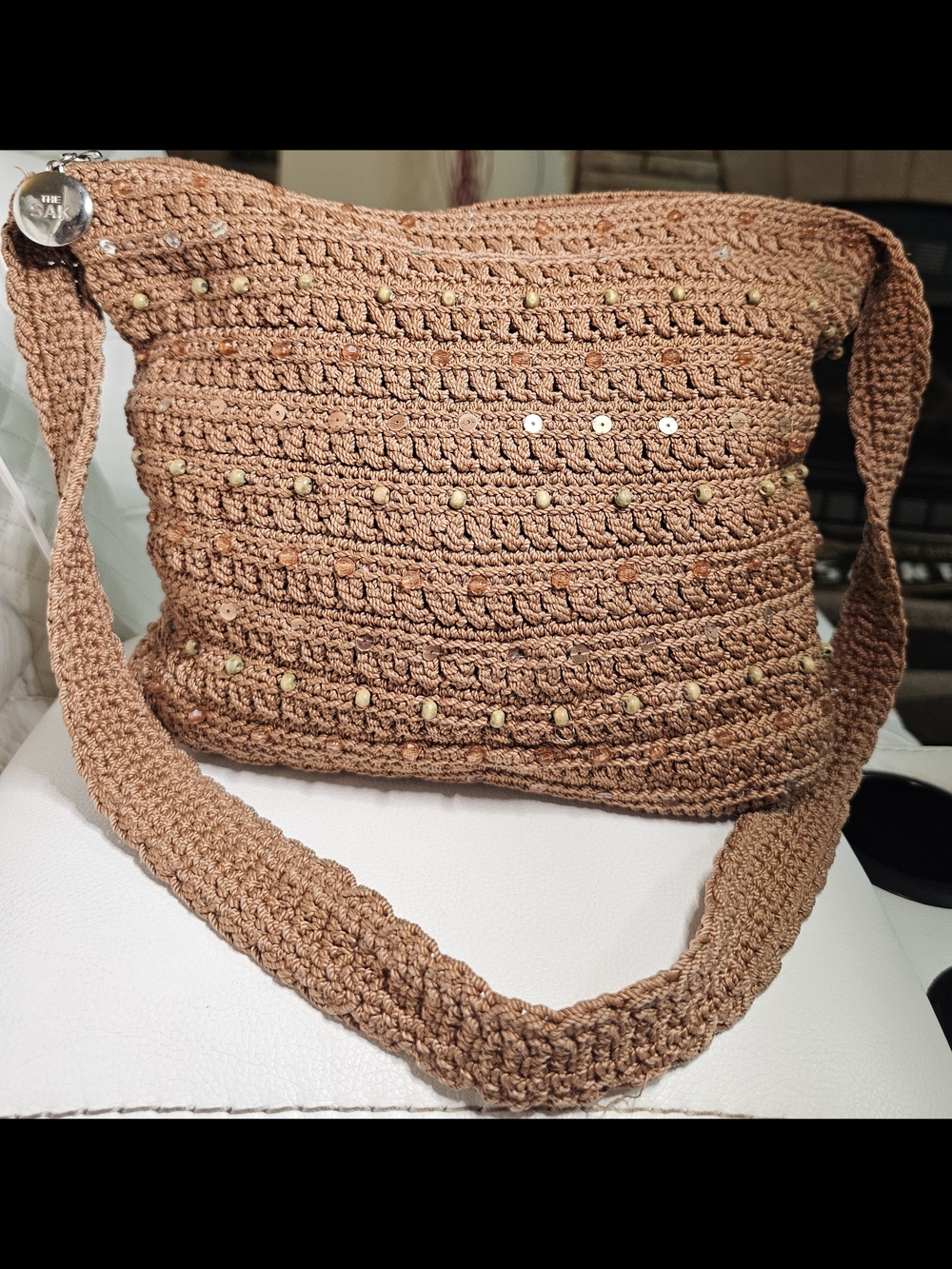 Brown Crochet shoulder bag from The Sak featuring beaded and sequined